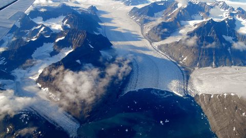 The Greenland Ice Sheet, seen here in Oct. 2018, is melting at a rapidly accelerating rate because of Earth's warming climate. As the ice melts into the ocean, it raises the sea level around the world, causing flooding and other damage to coastal communities. (NASA/JPL-Caltech)