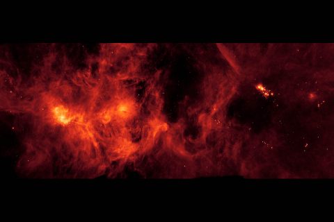 A collection of gas and dust over 500 light-years across, the Perseus Molecular Cloud hosts an abundance of young stars. It was imaged here by the NASA's Spitzer Space Telescope. (NASA/JPL-Caltech)