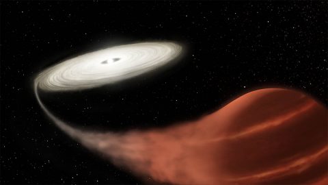 This illustration shows a newly discovered dwarf nova system, in which a white dwarf star is pulling material off a brown dwarf companion. The material collects into an accretion disk until reaching a tipping point, causing it to suddenly increase in brightness. (NASA and L. Hustak (STScI))