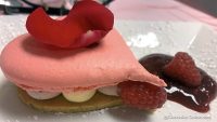 Chef Pierre Herme-inspired Isaphan (Rose, Raspberry and Lychee) Macaron Cake filled with butter creme, hints of chocolate and raspberry, and a dollop of Raspberry Coulis on the side.