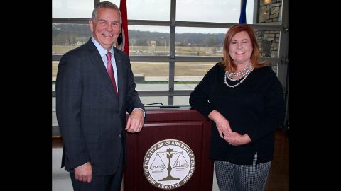 Joyce Arms, a 40-year employee at CDE Lightband and among the longest-serving City employees, is congratulated Wednesday by Clarksville Mayor Joe Pitts. The City presented pins marking service in 5-year increments to 166 workers at its annual employee awards breakfast.