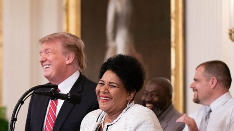 President Donald Trump congratulates former inmates who benefited from the First Step Act at the 2019 White House Prison Reform Summit.