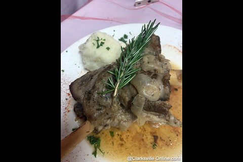 Lamb shank braised on the stove top, seasoned with salt and pepper, then slow-roasted for four hours with veal stock, honey, onion and thyme. Topped with a sprig of rosemary