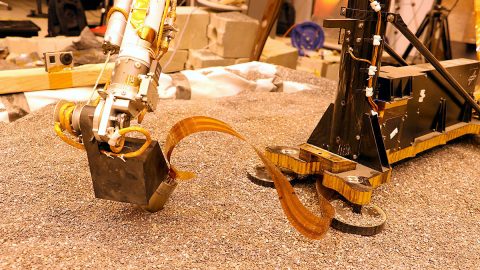 This test using an engineering model of the InSight lander here on Earth shows how the spacecraft on Mars will use its robotic arm to press on a digging device, called the "mole." (NASA/JPL-Caltech) This test using an engineering model of the InSight lander here on Earth shows how the spacecraft on Mars will use its robotic arm to press on a digging device, called the "mole." (NASA/JPL-Caltech)