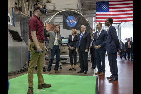 Pat Troutman, space architect, second from left, shows off how Langley is using virtual reality to plan Moon and Mars missions. Looking on from the right is Clayton Turner, Langley center director; Jim Bridenstine, NASA administrator; Vanessa Wyche, deputy director NASA's Johnson Space Center; Vice President Mike Pence; and Betsy Davos, education secretary. (NASA/David C. Bowman)