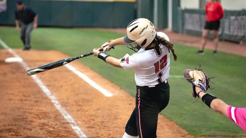 Austin Peay State University Softball junior #12 Brooke Pfefferle hits a single in the bottom of the 10th to score #6 junior Bailey Shorter for 3-2 win over Bradley. (APSU Sports Information)