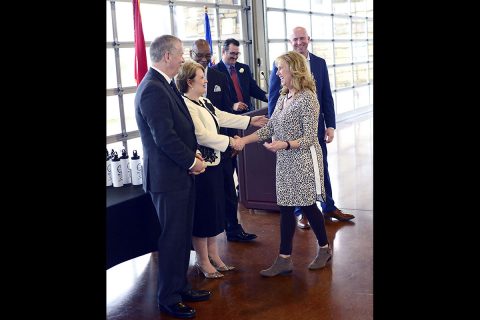 Denise Johnson, Human Resources Analyst, was one of 18 “Shining Stars” honored Monday as part of the City of Clarksville’s “Cause for Applause” employee recognition program. She accepts congratulations from Clarksville Mayor Joe Pitts and First Lady Cynthia Pitts during the breakfast event at the Wilma Rudolph Events Center.