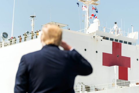 President Trump salutes the USNS Comfort as she departs Naval Air Station Norfolk Pier 8 in Virginia en route to New York City. (White House)