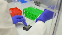 Co-Diagnostics technician sets up a plate for the CoDx Box thermocycler