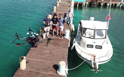 Researchers flying the FluidCam instrument during a field deployment in Puerto Rico. (NASA)