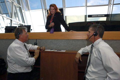 NASA Launch Director Charlie Blackwell-Thompson, above, confers with Senior NASA Test Director Jeff Spaulding, left, and Test, Launch and Recovery Operations Branch Chief Jeremy Graeber in Firing Room 1 at Kennedy Space Center's Launch Control Center during a countdown simulation. (NASA/Cory Huston)