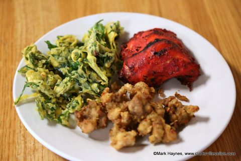 Dine-in restaurants can reopen doors this week. Pictured is Spinach Pakora, Tandoor Chicken and Chicken Pakoda from Tandoor Indian Bistro.