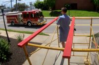 Austin Peay State University’s Bryan Gaither works with Clarksville Fire Rescue to demostrate the Doppler effect. (APSU)