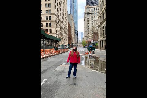 Austin Peay State University nursing student Sarah Sullivan stands on an abandoned street near the new World Trade Center (in background). (APSU)