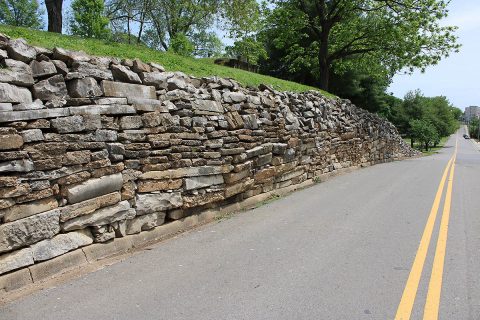 This failing old stone wall along Spring Street at Riverview Cemetery will be replaced in a project that begins June 1st.