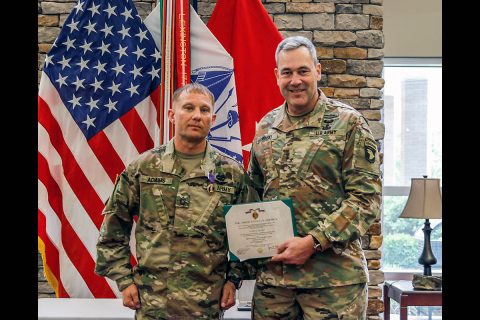 U.S. Army Sgt. 1st Class Leonard P. Adams, a Michigan National Guard flight medic with Detachment 1, Company C, 3-238th General Support Aviation Battalion in Grand Ledge, Michigan, was awarded the Purple Heart on May 5, 2020 in a small ceremony at Fort Campbell, Kentucky. (Courtesy photo)