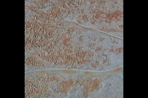 This image shows chaos terrain where blocks of material have shifted, rotated, tilted and refrozen. Scientists use this as a puzzle for clues about how the surface has changed. The area is called Chaos Near Agenor Linea for its proximity to the wide band of that name at the bottom of the image. (NASA/JPL-Caltech/SETI Institute)