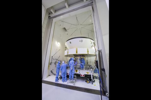 The spacecraft that will carry NASA's Perseverance rover to Mars is examined prior to an acoustic test in the Environmental Test Facility at the Jet Propulsion Laboratory in Southern California. The image was taken on April 11th, 2019. (NASA/JPL-Caltech)