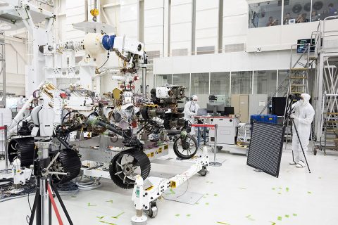 In this image, engineers test cameras on the top of the mast and front chassis of NASA's Perseverance Mars rover. The image was taken on July 23, 2019, at NASA's Jet Propulsion Laboratory in Southern California. (NASA/JPL-Caltech)