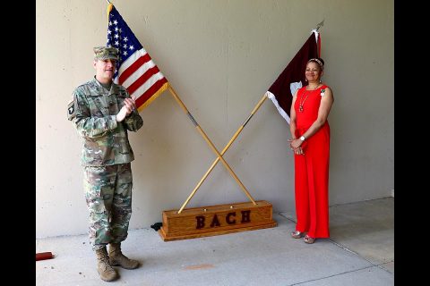 Blanchfield Army Community Hospital Commander, Col. Patrick T. Birchfield gave praise to Ms. Willie Mae Guidry during an outdoor award ceremony recognizing her selection as Regional Health Command Atlantic Fiscal Year 2019 Civilian of the Year, Category 1. (U.S. Army photo by Maria Yager)