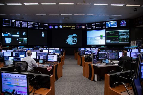 The view from Mission Control Houston as the SpaceX Crew Dragon docks to the International Space Station. (NASA / Bill Stafford)