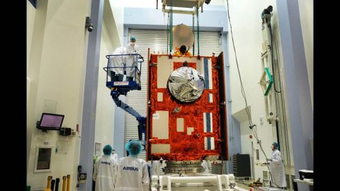 The Sentinel-6 Michael Freilich satellite sits in front of a testing chamber where mission team members tested whether the spacecraft could endure the loud sounds it will encounter during launch. (Airbus)