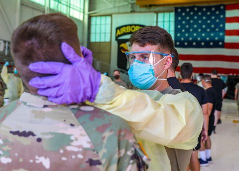 A 101st Airborne Division Soldier receives a COVID test at Fort Campbell, Kentucky, July 27th. The Soldier is one of more than 4,000 Soldiers who will receive a mandatory COVID test prior to a deployment to the Joint Readiness Training Center at Fort Polk, Louisiana. Soldiers who test positive will remain in isolation at Fort Campbell until cleared by medical professionals. (U.S. Army photo by Sgt. Justin Navin) A 101st Airborne Division Soldier receives a COVID test at Fort Campbell, Kentucky, July 27th. The Soldier is one of more than 4,000 Soldiers who will receive a mandatory COVID test prior to a deployment to the Joint Readiness Training Center at Fort Polk, Louisiana. Soldiers who test positive will remain in isolation at Fort Campbell until cleared by medical professionals. (U.S. Army photo by Sgt. Justin Navin)