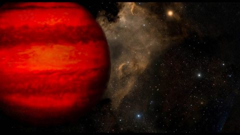 This artist's concept shows a brown dwarf, a ball of gas not massive enough to power itself the way stars do. Despite their name, brown dwarfs would appear magenta or orange-red to the human eye if seen close up. (William Pendrill (CC BY))