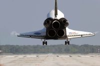 Space shuttle Atlantis nears touchdown on Runway 33 at the Shuttle Landing Facility at NASA’s Kennedy Space Center in Florida. (NASA/Tony Gray/Tom Farrar)