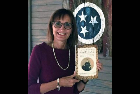 Austin Peay State University professor of history Dr. Minoa Uffelman holds the Diary of Serepta Jordan. (APSU)