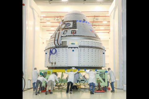 The CST-100 Starliner spacecraft to be flown on Boeing’s Orbital Flight Test (OFT) is viewed Nov. 2, 2019, while undergoing launch preparations inside the Commercial Crew and Cargo Processing Facility at Kennedy Space Center in Florida. (Boeing)