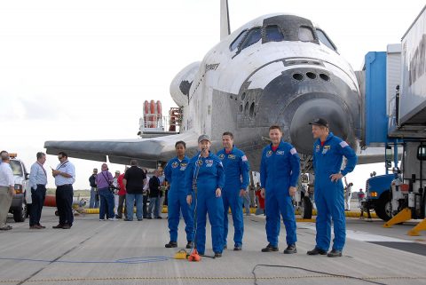 STS-120 Commander Pamela Melroy talked to media and guests on the Shuttle Landing Facility at NASA's Kennedy Space Center after landing Space Shuttle Discovery. Behind her from left are mission specialist Stephanie Wilson, pilot George Zamka and mission specialists Doug Wheelock and Scott Parazynski. Mission STS-120 continued the construction of the station with the installation of the Harmony Node 2 module and the relocation of the P6 truss. (Kim Shiflett) STS-120 Commander Pamela Melroy talked to media and guests on the Shuttle Landing Facility at NASA's Kennedy Space Center after landing Space Shuttle Discovery. Behind her from left are mission specialist Stephanie Wilson, pilot George Zamka and mission specialists Doug Wheelock and Scott Parazynski. Mission STS-120 continued the construction of the station with the installation of the Harmony Node 2 module and the relocation of the P6 truss. (Kim Shiflett)