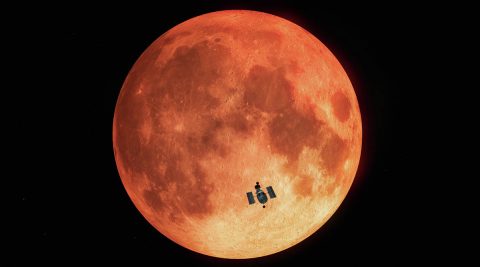 This illustration shows the Hubble Space Telescope superimposed on an image of the Moon, seen during a lunar eclipse. Taking advantage of a total lunar eclipse in January 2019, astronomers using NASA's Hubble Space Telescope have detected ozone in Earth's atmosphere. This method serves as a proxy for how they will observe Earth-like planets transiting in front of other stars in search of life. (M. Kornmesser (ESA/Hubble), NASA, and ESA) This illustration shows the Hubble Space Telescope superimposed on an image of the Moon, seen during a lunar eclipse. Taking advantage of a total lunar eclipse in January 2019, astronomers using NASA's Hubble Space Telescope have detected ozone in Earth's atmosphere. This method serves as a proxy for how they will observe Earth-like planets transiting in front of other stars in search of life. (M. Kornmesser (ESA/Hubble), NASA, and ESA)
