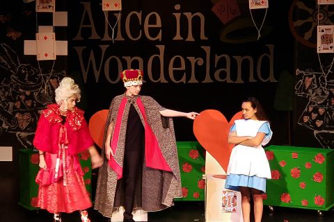 Roxy Regional Theatre School of the Arts students performing in 2019's production of Disney's Alice in Wonderland, Jr.