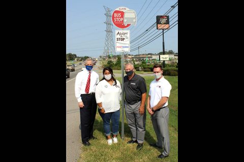 FastSigns of Clarksville, which is moving to 119 West Dunbar Cave Road, Clarksville, on Oct. 1, has joined with Clarksville Transit’s Adopt-A-Stop program to take care of several bus stops along Wilma Rudolph Boulevard. FastSigns Owner Alan Grayson helped unveil signs Friday with from left, Mayor Joe Pitts, Veronica Williams, and CTS Director Paul Nelson