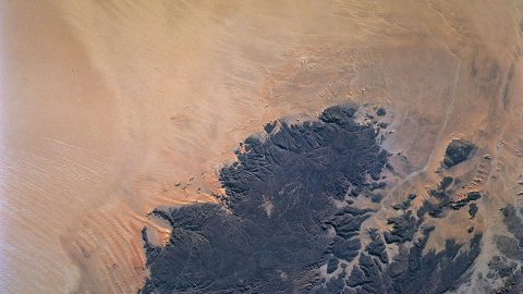 Deserts like the Sahara harbor fresh water aquifers that can be affected by Earth's changing climate. The OASIS study project seeks to a establish a mission that would find and examine those aquifers. (NASA)