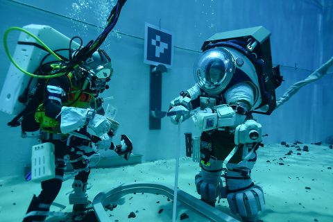 Teams are evaluating how to train for lunar surface operations during Artemis missions, in the Neutral Buoyancy Lab at Johnson Space Center in Houston. (NASA) Teams are evaluating how to train for lunar surface operations during Artemis missions, in the Neutral Buoyancy Lab at Johnson Space Center in Houston. (NASA)