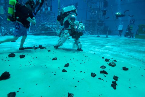 Teams are assessing how to use tools and spacesuits, among other activities, during lunar testing activities in the NBL. (NASA) Teams are assessing how to use tools and spacesuits, among other activities, during lunar testing activities in the NBL. (NASA)