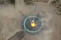The New Shepard (NS) booster lands after this vehicle’s fifth flight during NS-11 May 2, 2019. (Blue Origin)