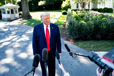 President Donald Trump talks to members of the press along the South Lawn driveway. (White House)