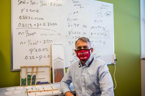 Austin Peay State University's Sam Ligo sits with some of the models he has created for his students. (APSU)