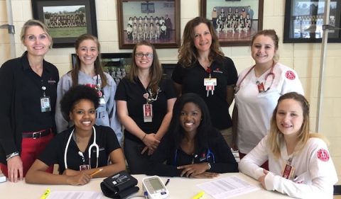 Austin Peay State University School of Nursing interim director Dr. Eve Rice (Left) with APSU nursing students and faculty. (APSU)