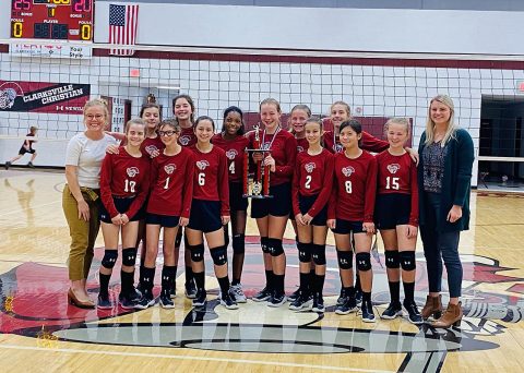 The Clarksville Christian School middle school team celebrates along with assistant Coach, Lexi Hendrix (far left), and head Coach Madison Poen (right).