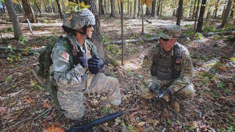 Zachary Labas, right, works with an Austin Peay State University ROTC cadet during a field training exercise prior to the COVID-19 Coronavirus pandemic at Fort Campbell, Kentucky. (APSU)