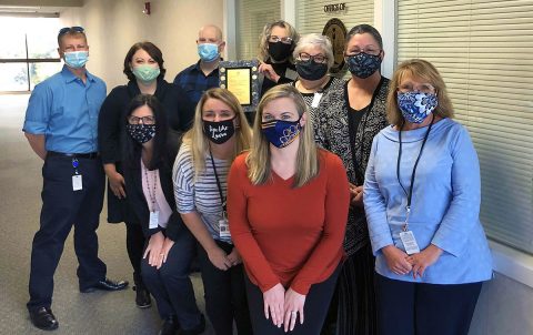 Staff members in the Clarksville Finance & Revenue Department joined with Chief Financial Officer Laurie Matta (holding certificate) to celebrate receiving the Certificate of Achievement for Excellence in Financial Reporting. 