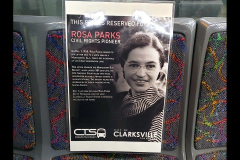 A Rosa Parks poster reserves a seat in honor of the Civil Rights pioneer on each Clarksville Transit System bus this week.