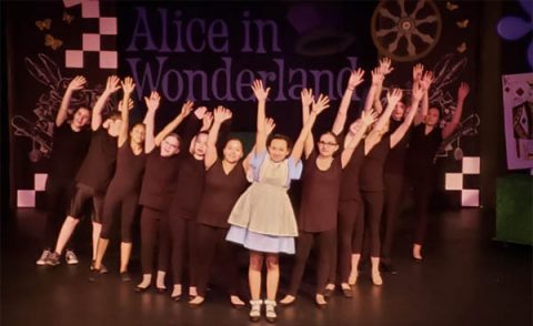 Roxy Regional Theatre School of the Arts students performing in 2019's production of Disney's Alice in Wonderland, Jr.