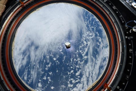 This fragment of a Martian meteorite, seen floating inside the International Space Station, is is now part of a calibration target for SuperCam, one of the instruments aboard NASA's Perseverance Mars rover. (NASA/JPL-Caltech /LANL/CNES/ESA/Thomas Pesquet)