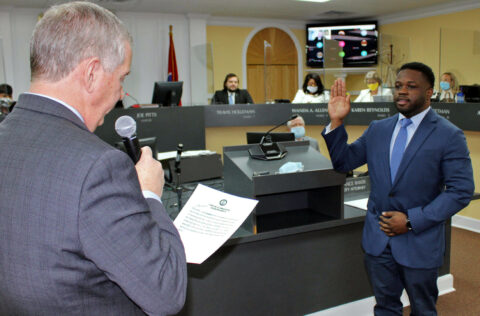 Clarksville Mayor Joe Pitts swears in DaJuan Little, Ward 3.