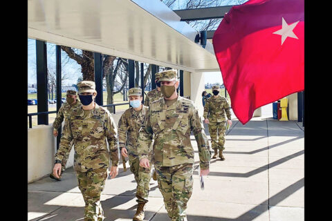 Blanchfield Army Community Hospital Commander Col. Patrick T. Birchfield, (right), escorts Regional Health Command-Atlantic Commanding General Brig. Gen. Paula Lodi and team members into BACH, Jan. 4. Lodi completed a three-day battlefield circulation observing COVID response efforts in the region Jan. 4-6. After meeting frontline healthcare workers at BACH, she went on to see those deployed to civilian hospitals in Wisconsin supporting the Urban Augmentation Medical Task Force. (U.S. Army photo by Maria Yager)